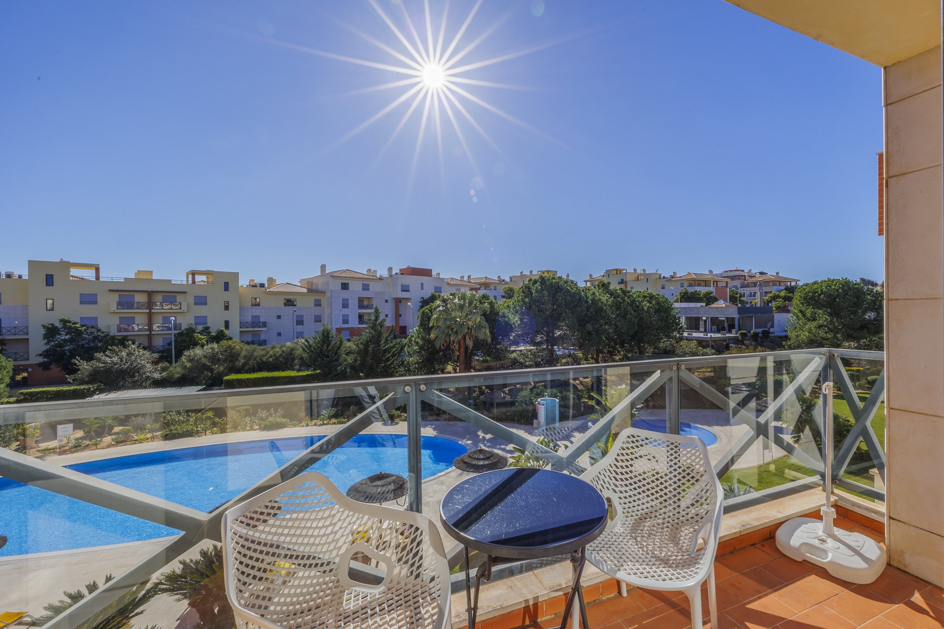 Balcony with communal pool view