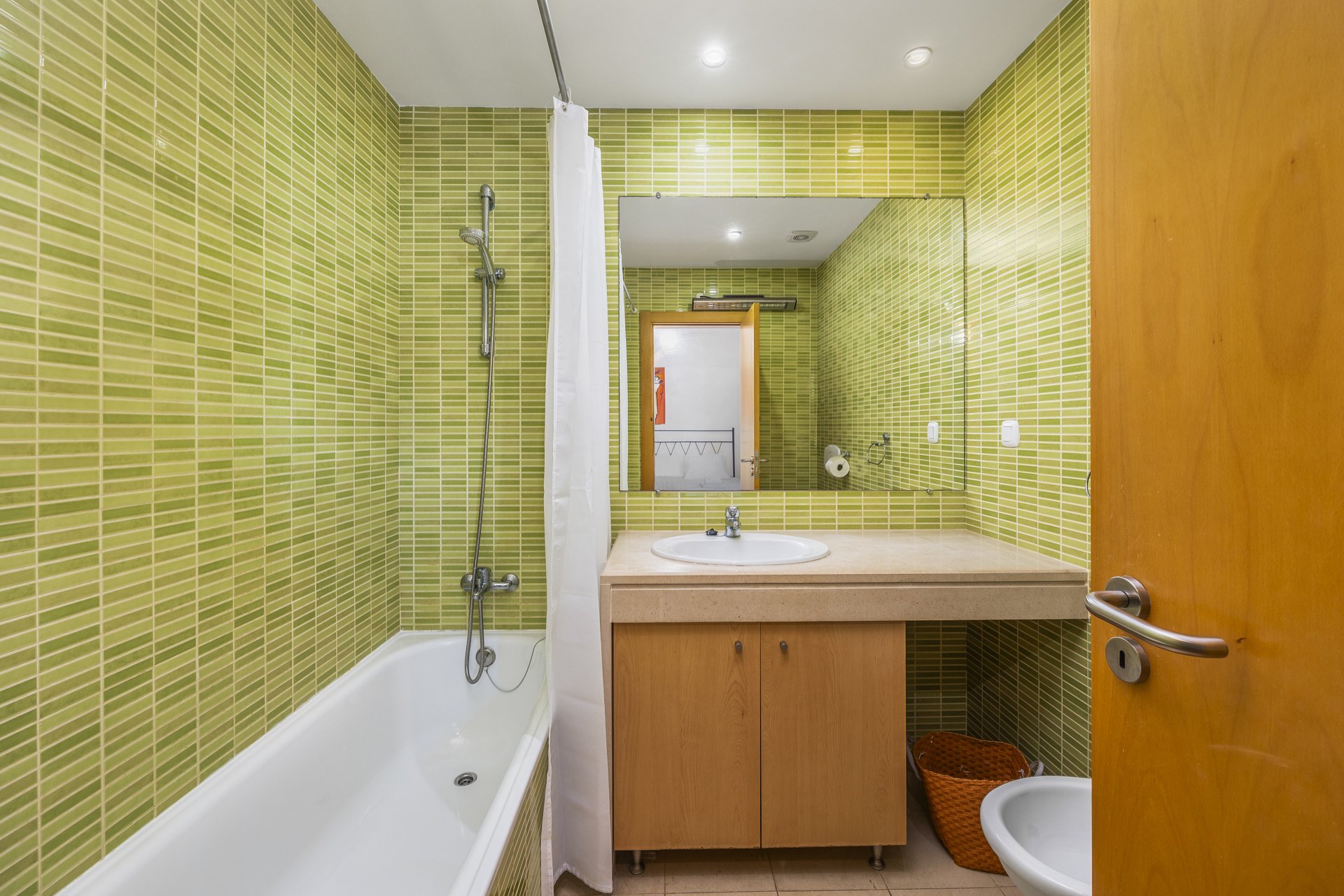 Bathroom with bathtub and shower