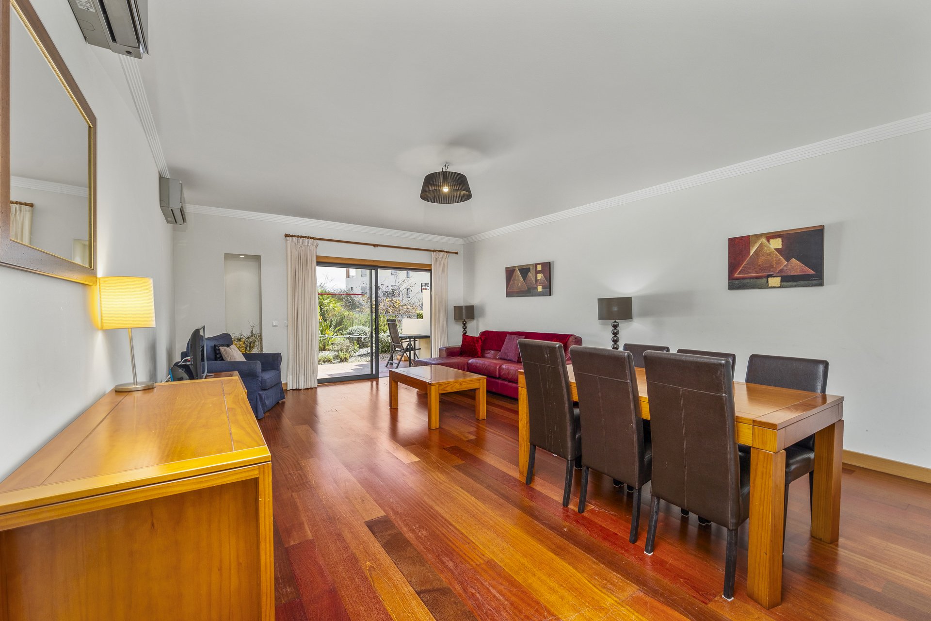 Dining area seating six with terrace access