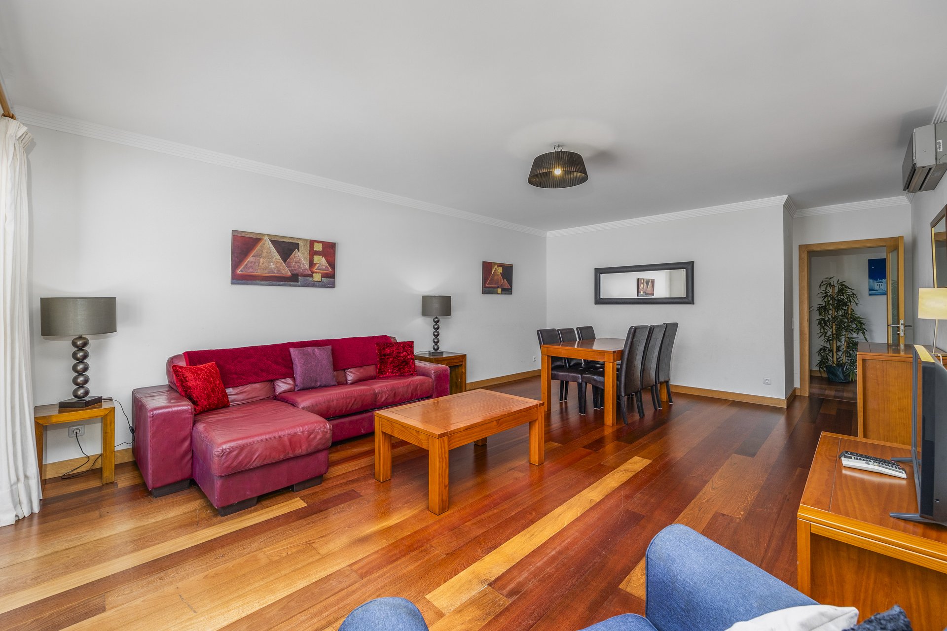 Living and dining area with view towards the terrace