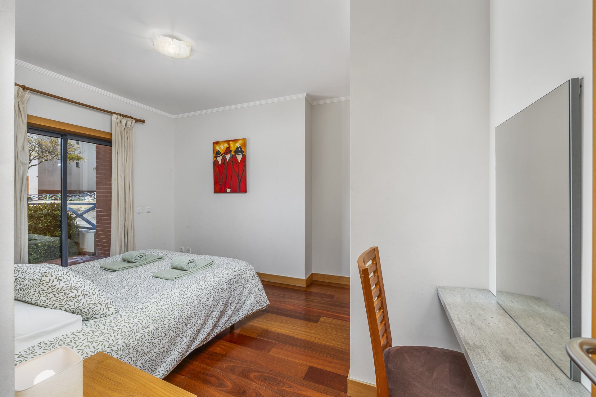 Second bedroom with double bed and private balcony access