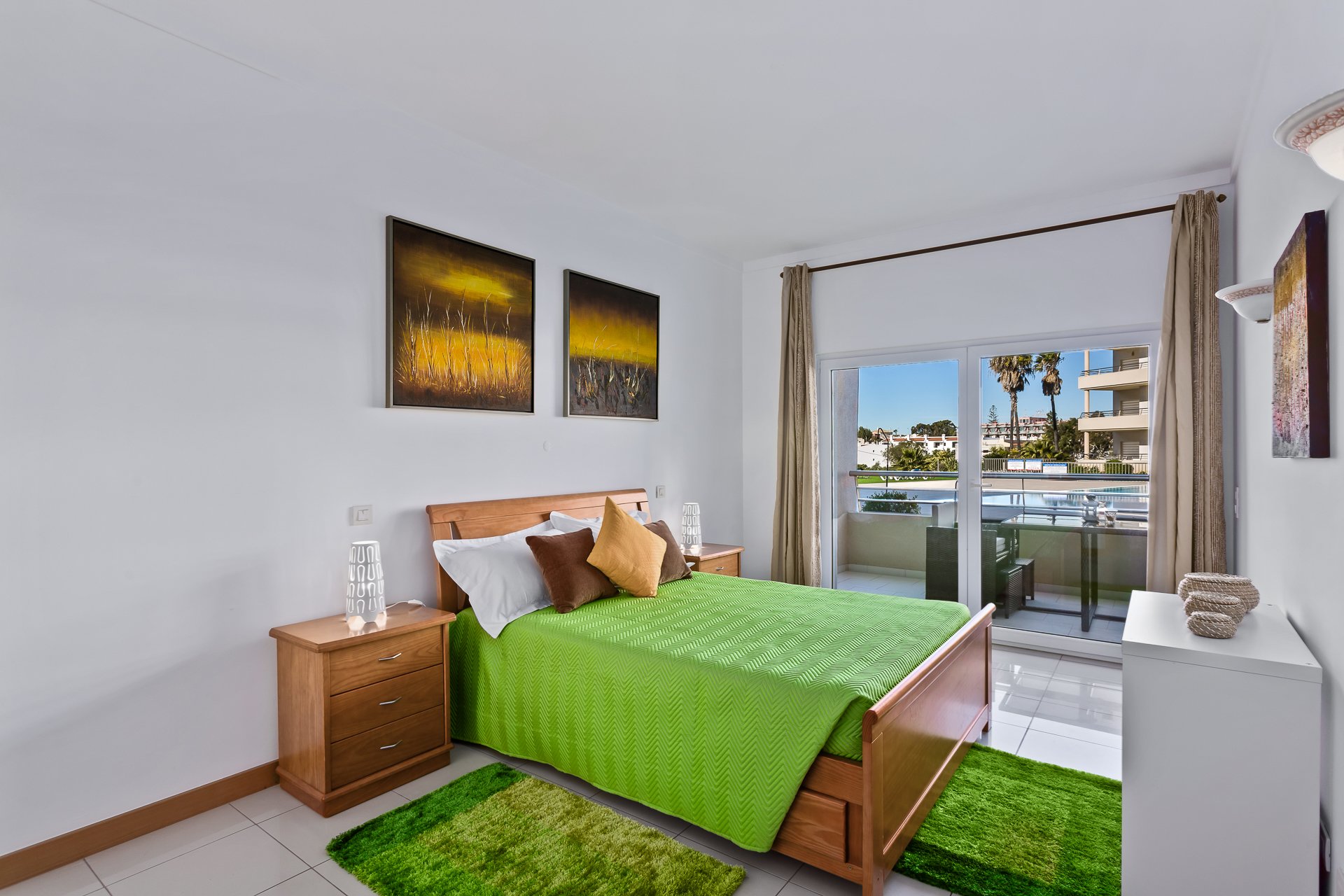 Bedroom with double bed and balcony access
