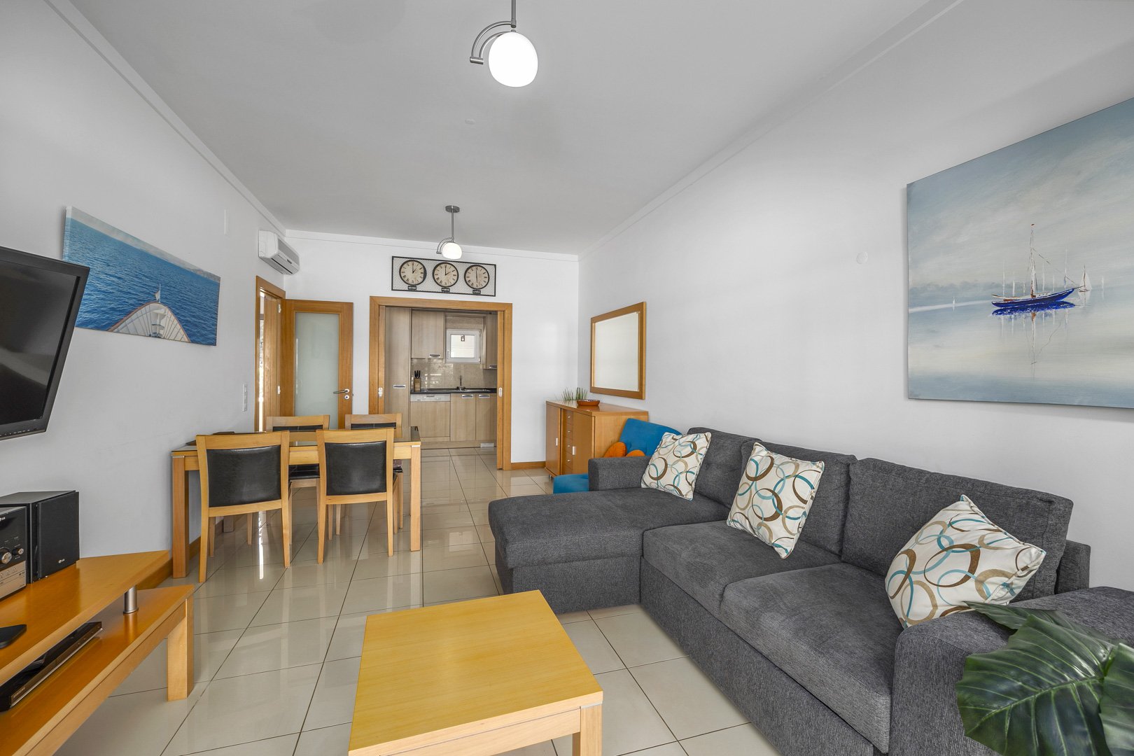 Living room with dining area and kitchen view