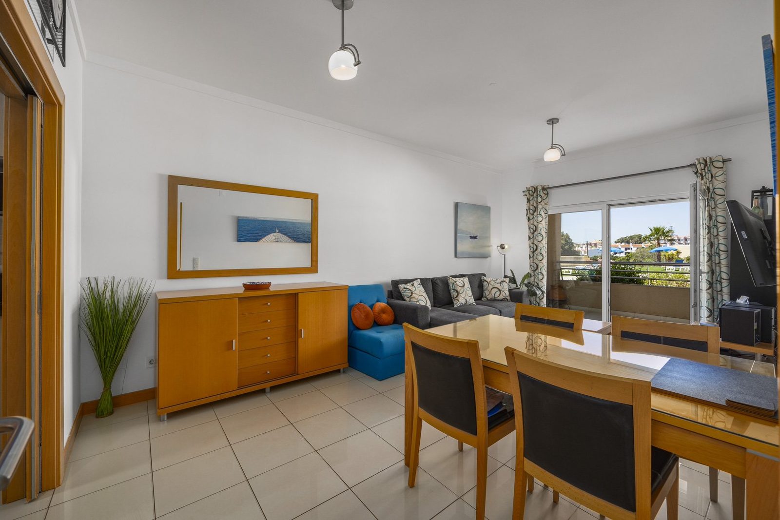Dining area with sideboard and mirror