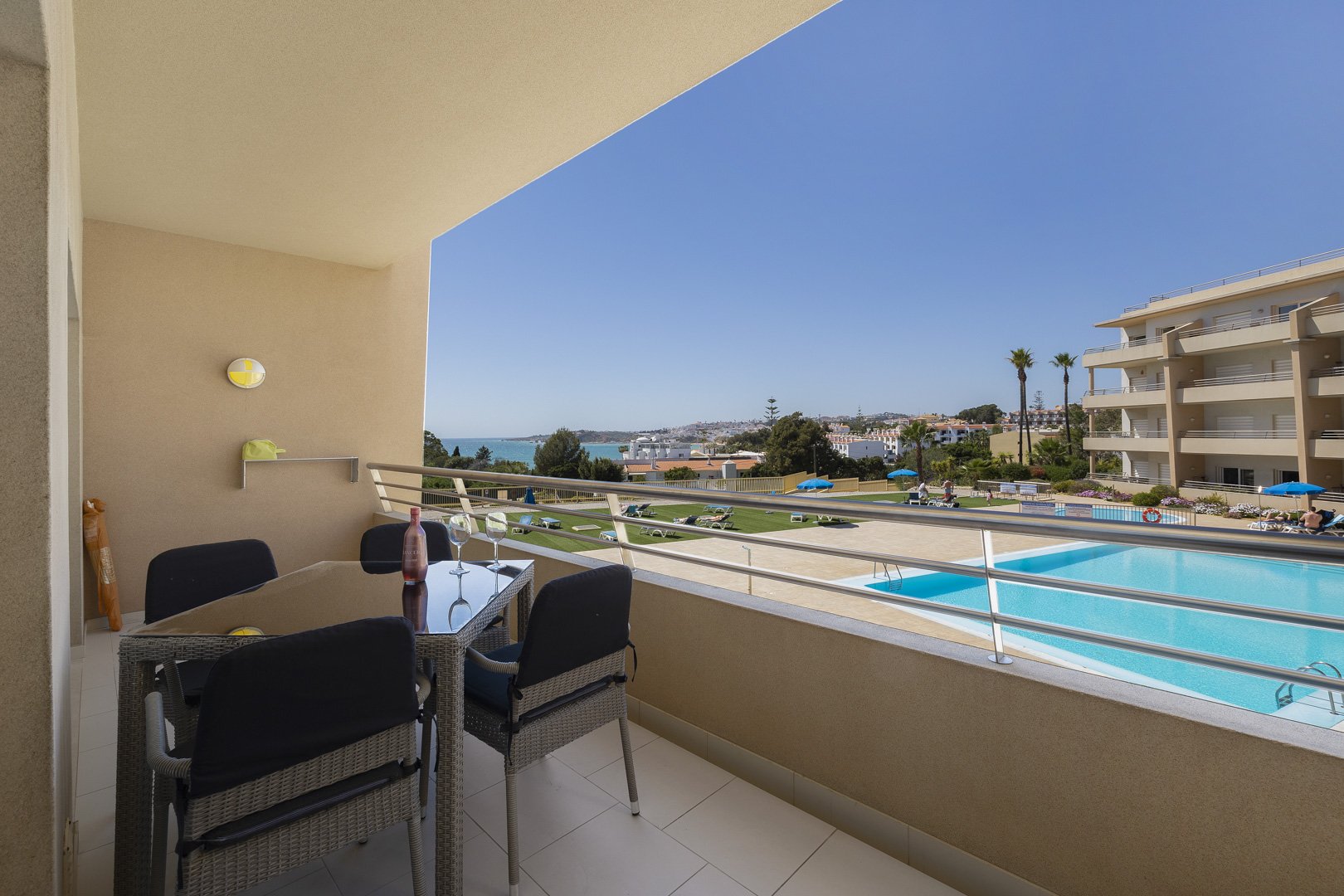 Balcony with sea and pool view
