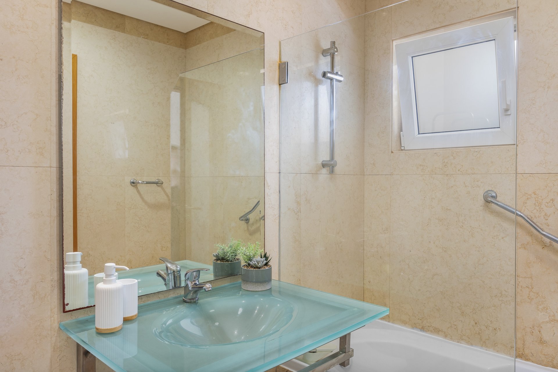 Bathroom sink and tub close-up view
