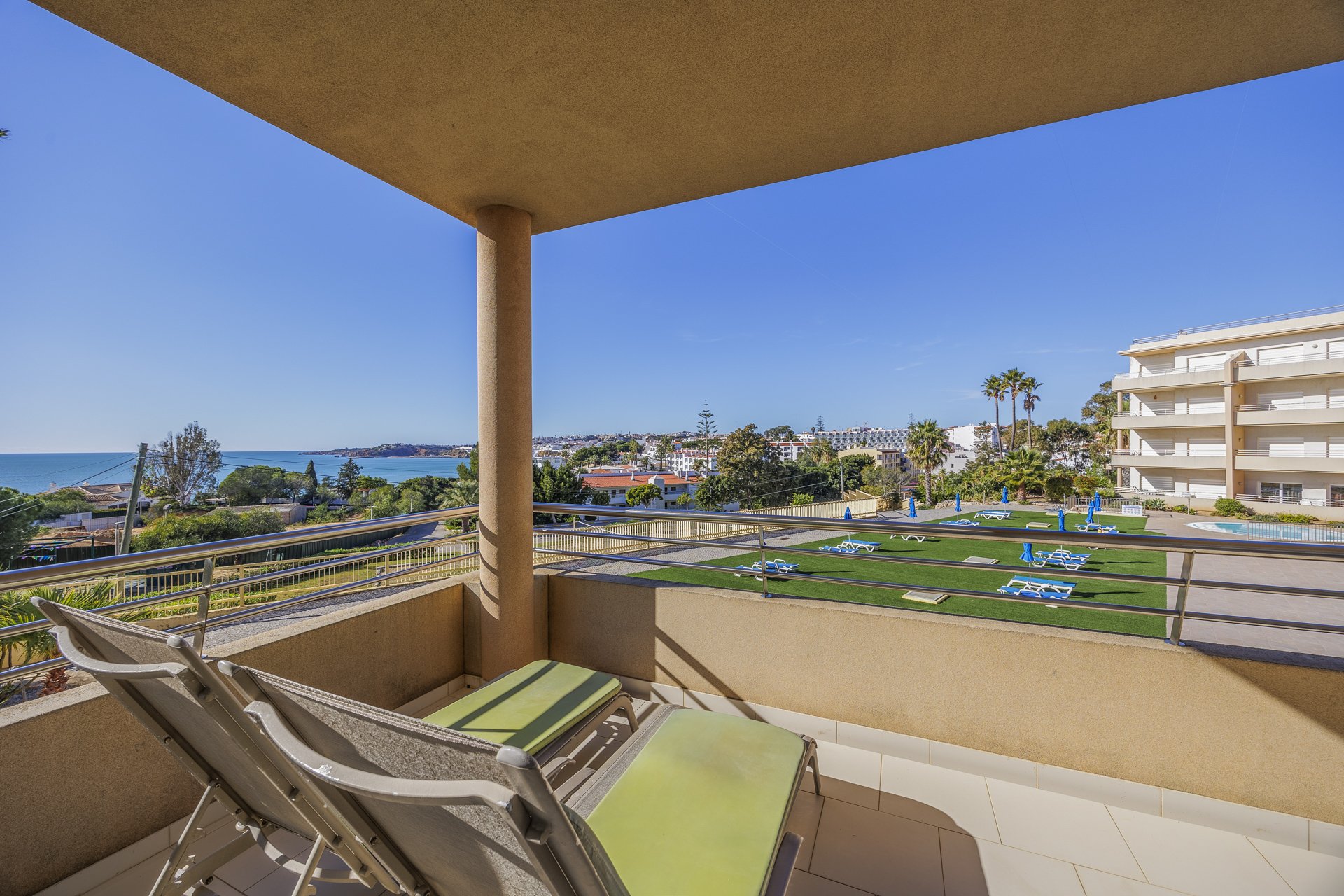 Terrace sun loungers with panoramic sea and garden view