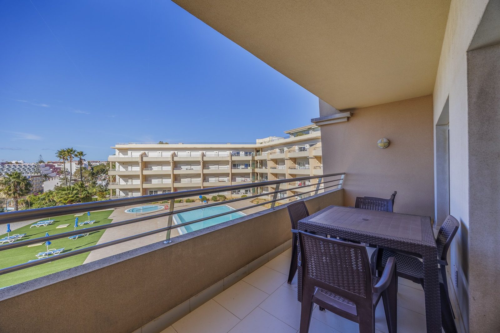 Balcony overlooking the pool courtyard