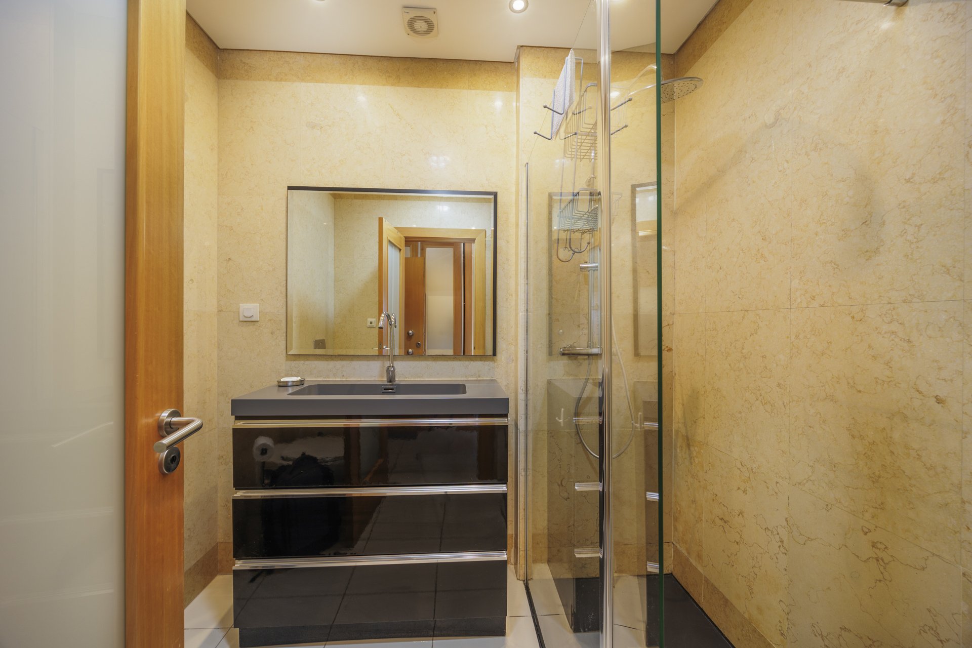 Bathroom with walk-in shower and vanity unit