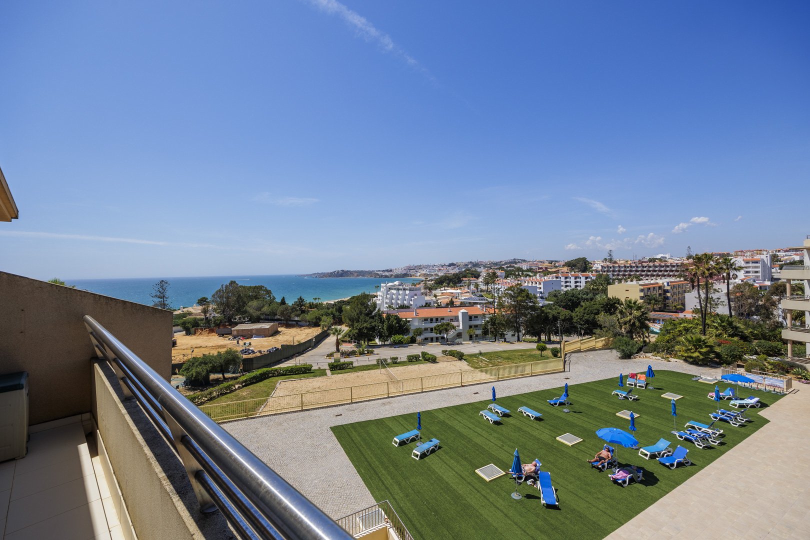 Balcony overlooking the sundeck and pool grounds