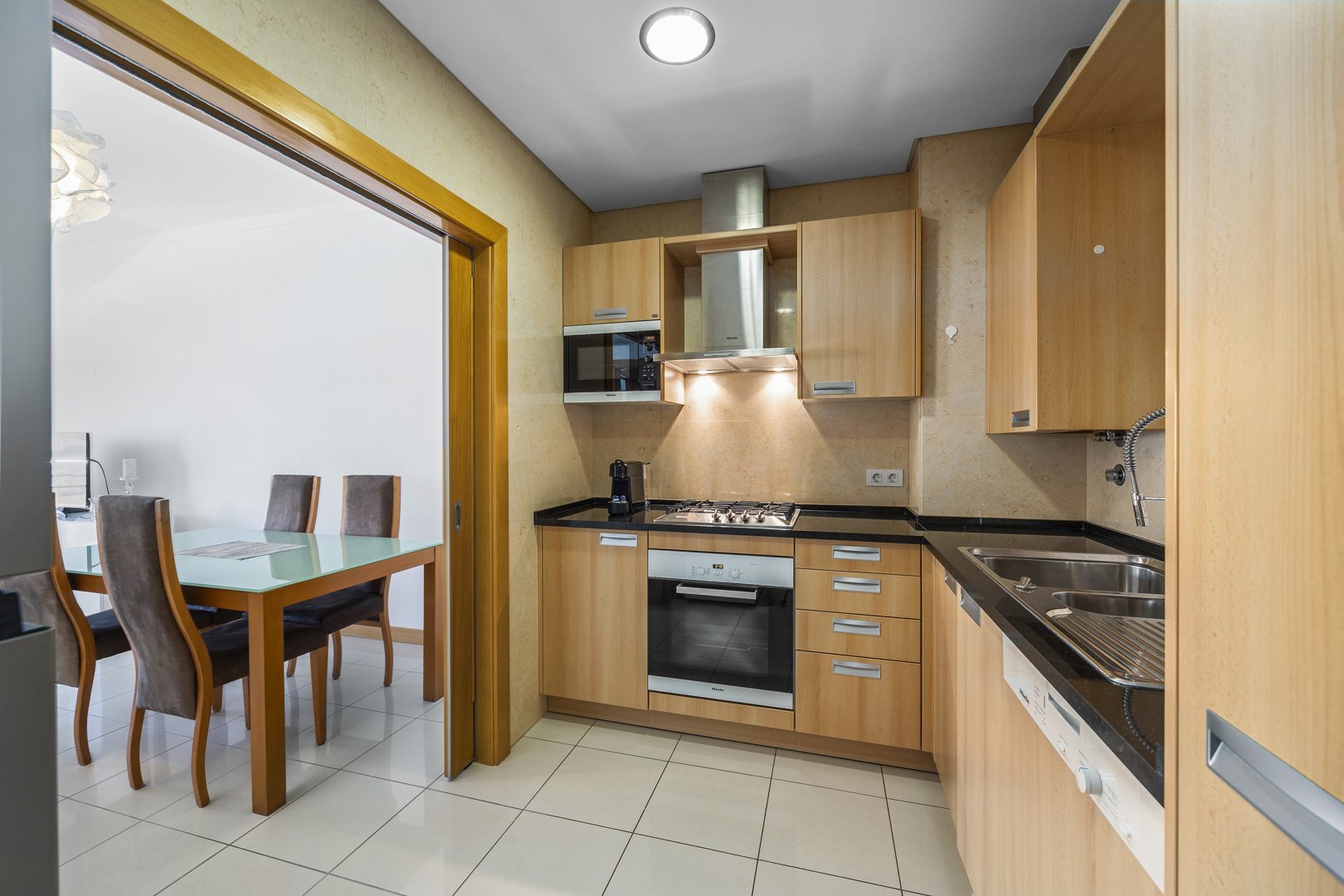 Kitchen with view through to the dining area