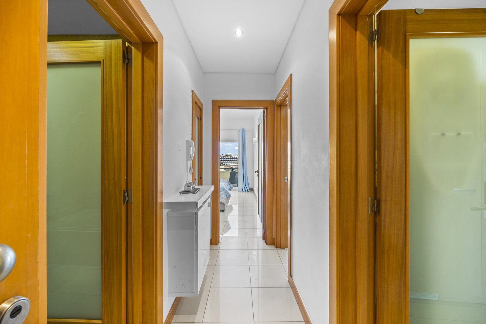 Hallway leading to the bedrooms and bathroom