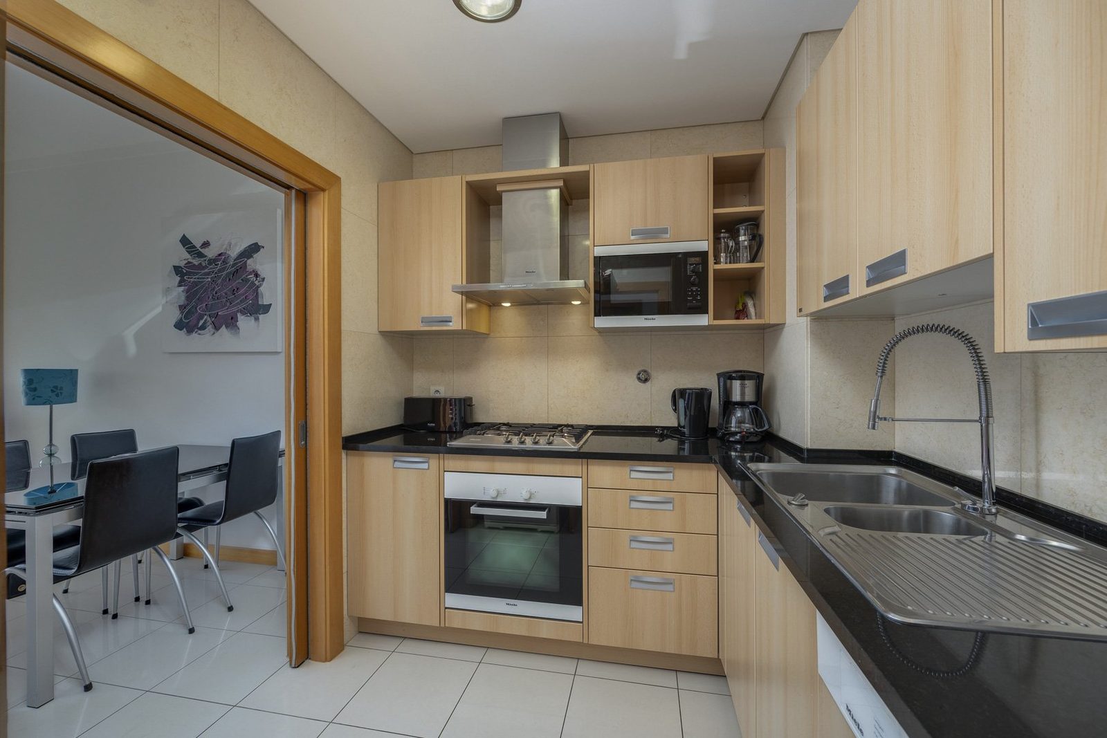 Kitchen with view through to the dining area