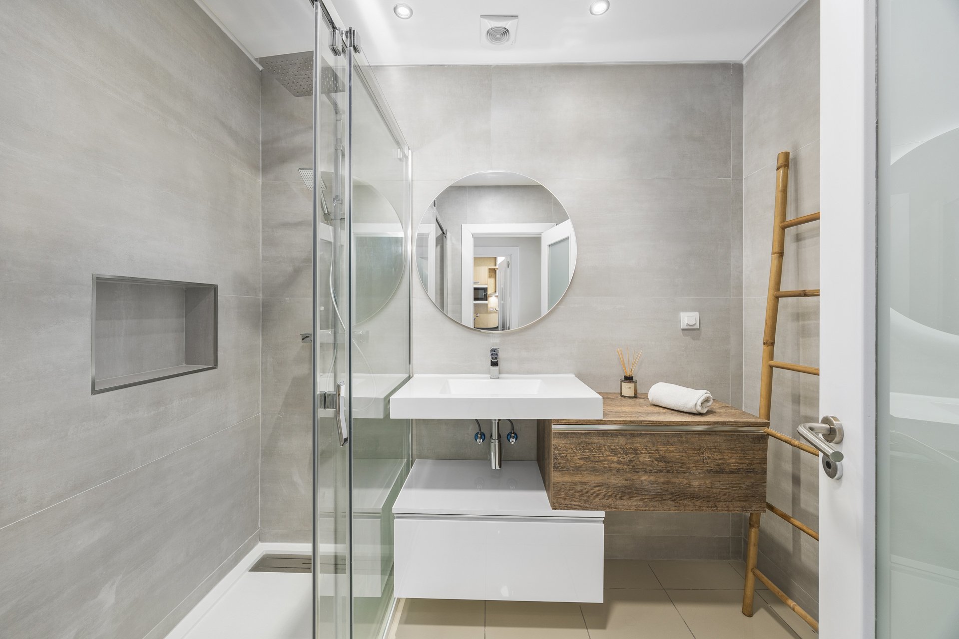 Bathroom with walk-in shower and floating vanity