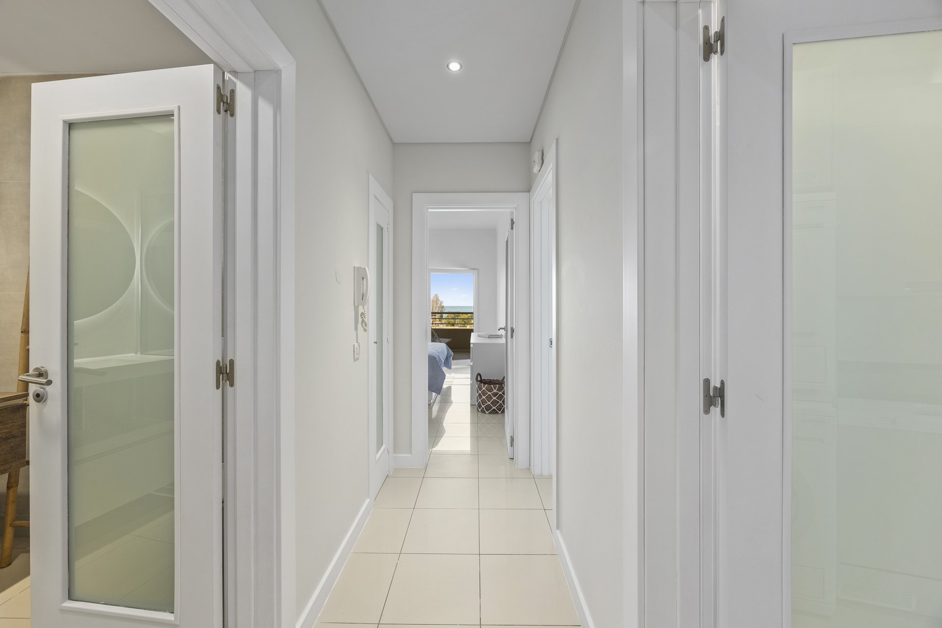 Hallway leading to the bedroom and bathroom