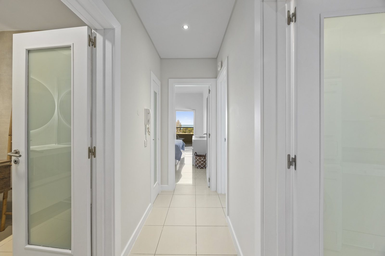 Hallway leading to the bedroom and bathroom
