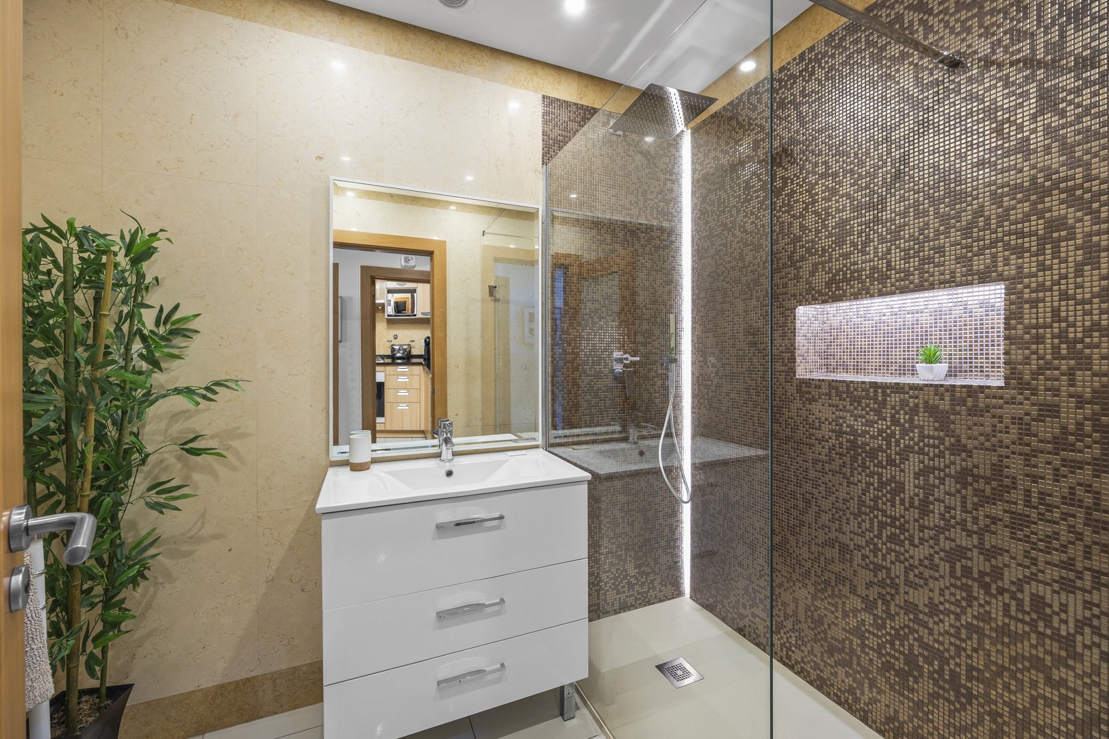 Bathroom with walk-in shower and vanity unit