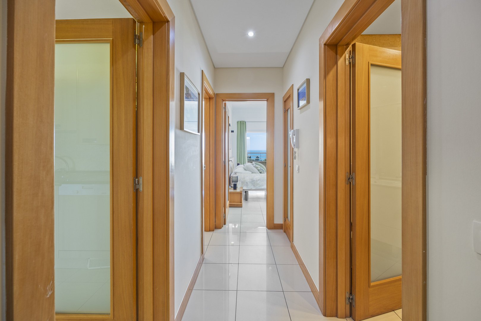 Hallway leading to the bedroom and bathroom