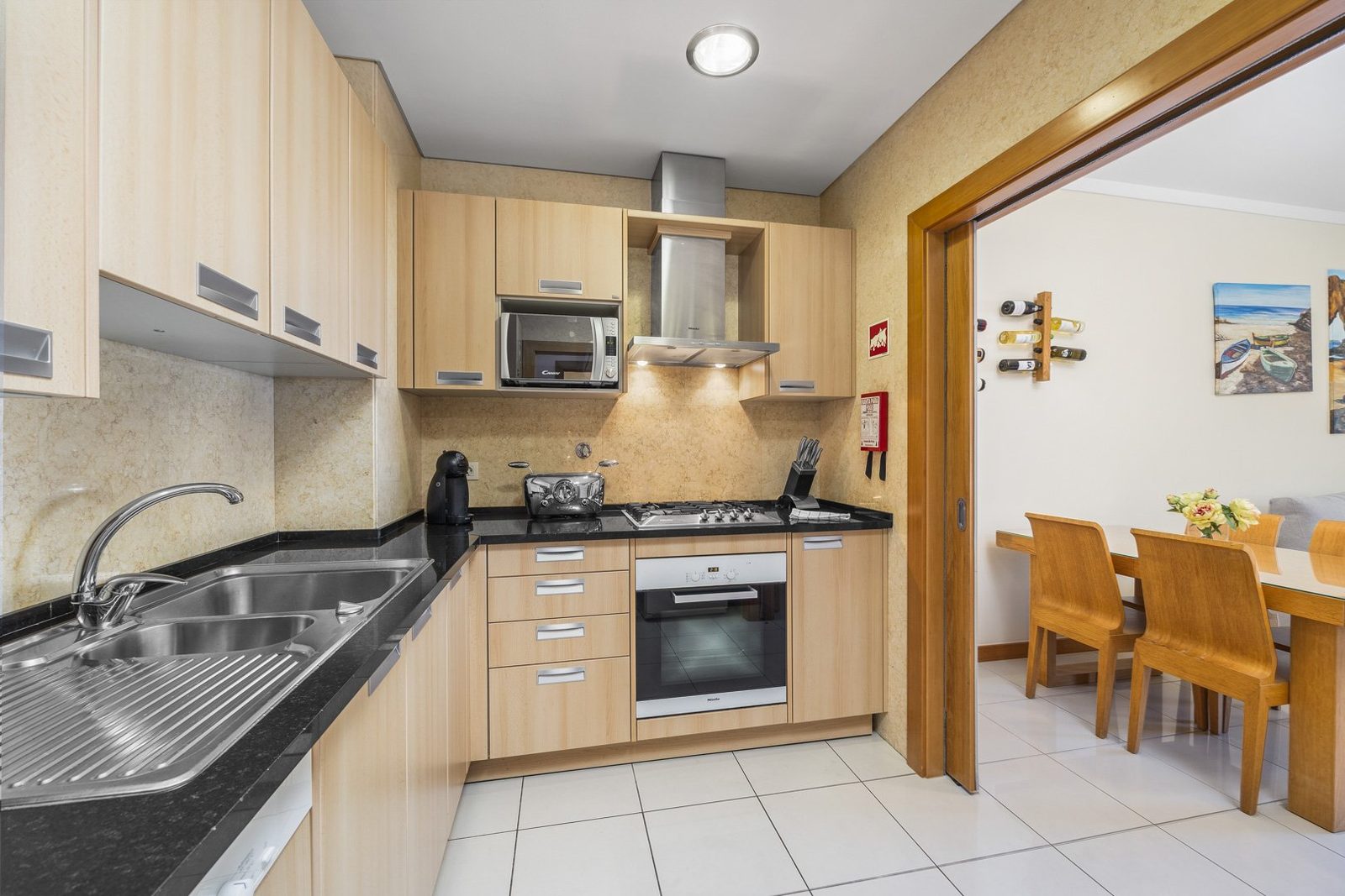 Kitchen with sink and view through to the dining area