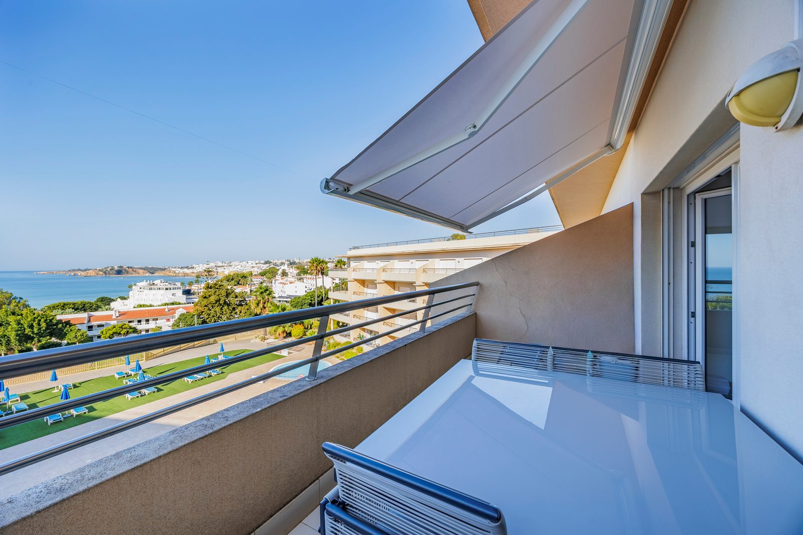 Balcony awning and the view along the coast to Albufeira