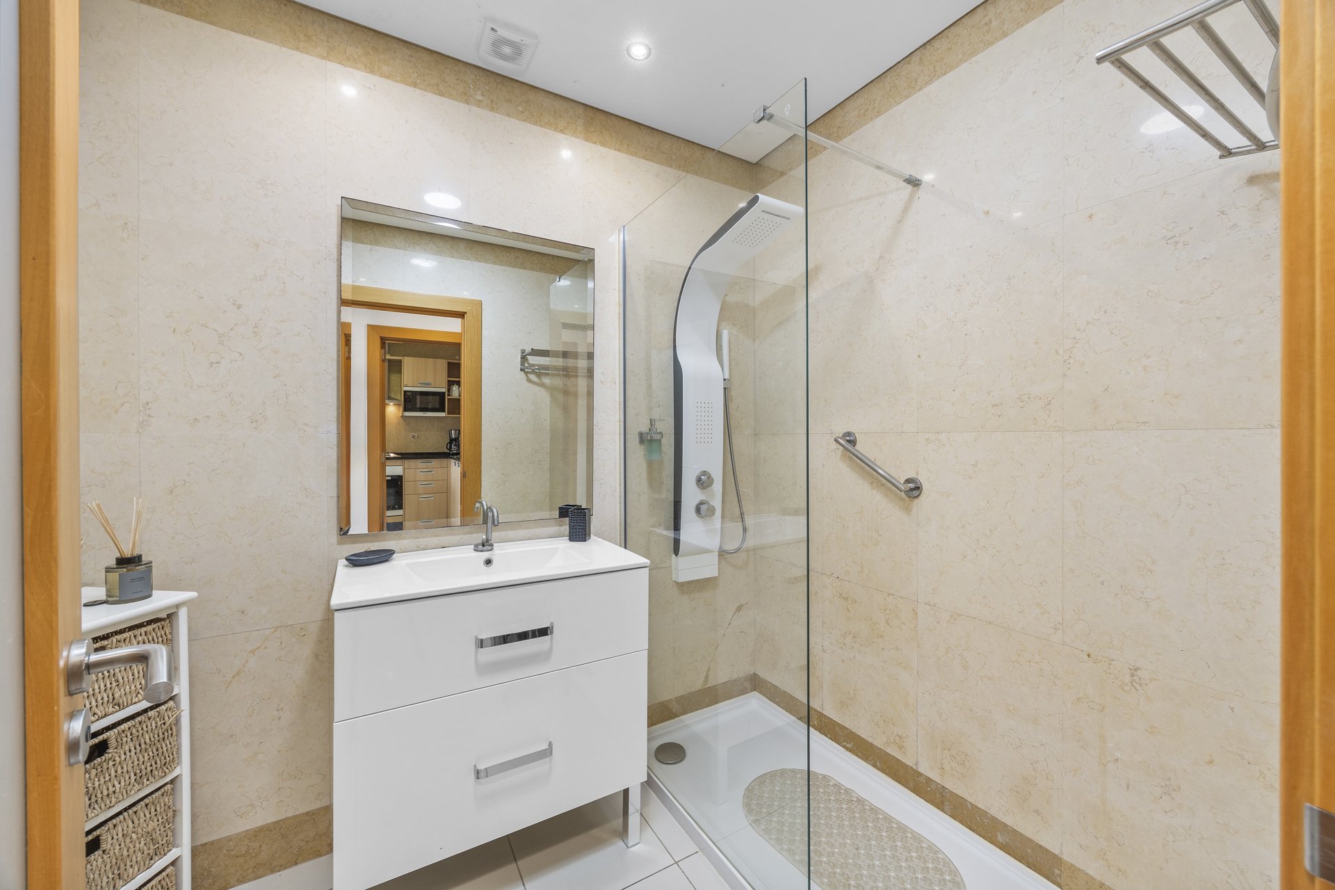 Bathroom with walk-in shower and vanity unit