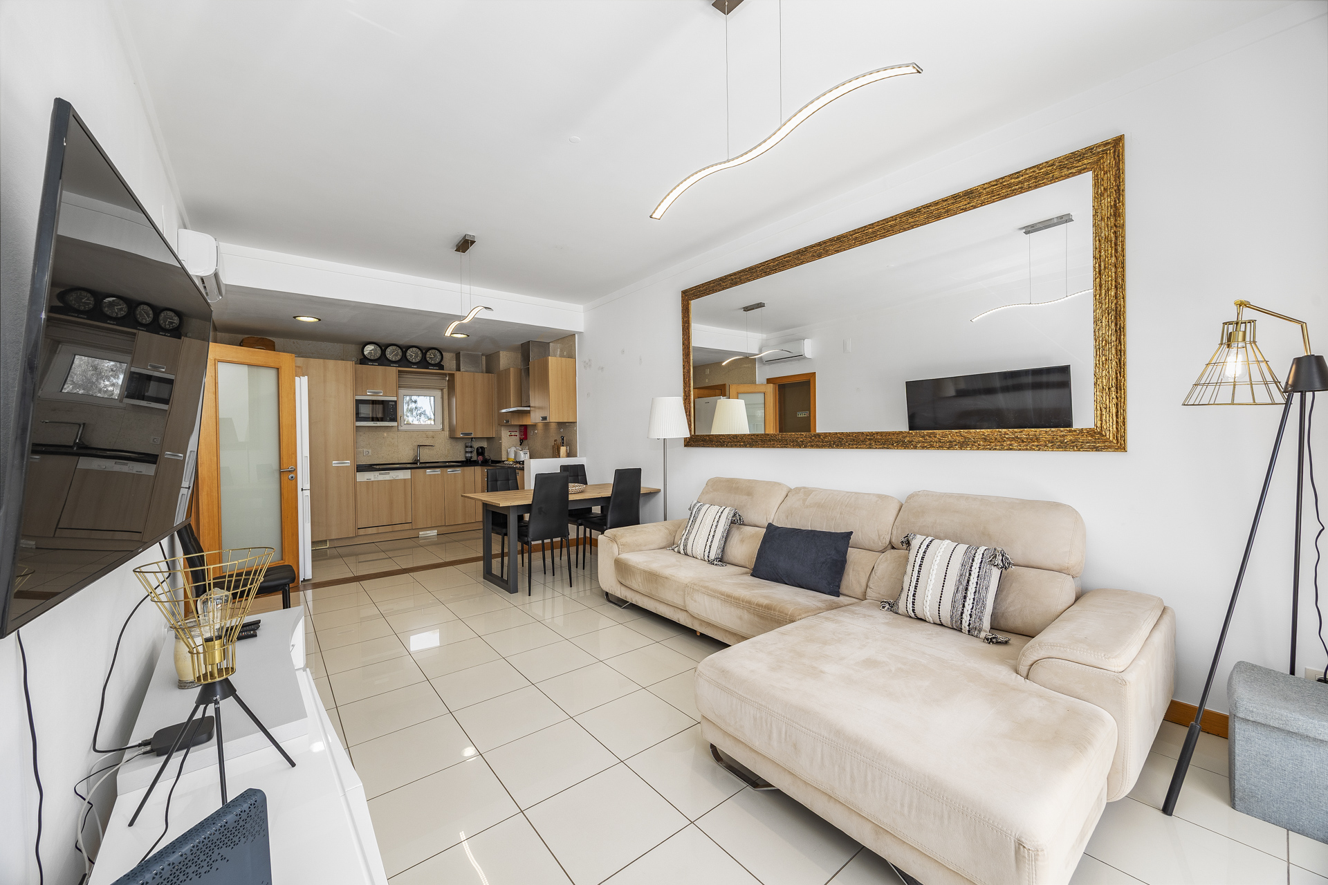 Open-plan living area with a view through to the kitchen and dining space