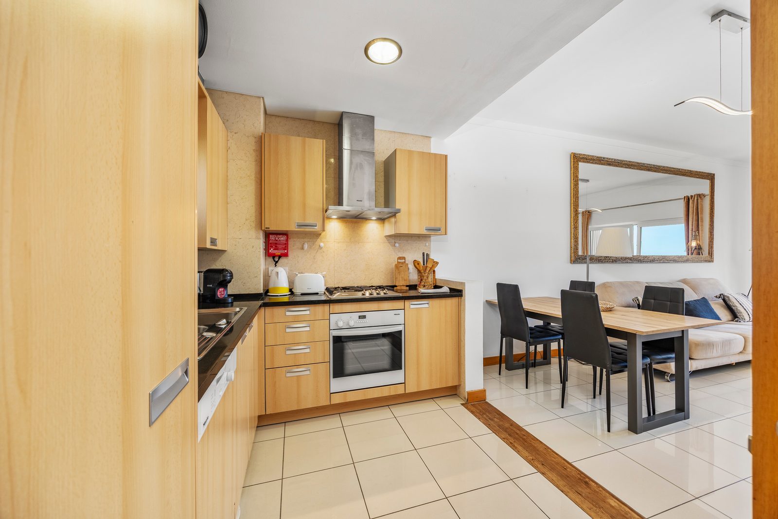 Kitchen with a view through to the dining table