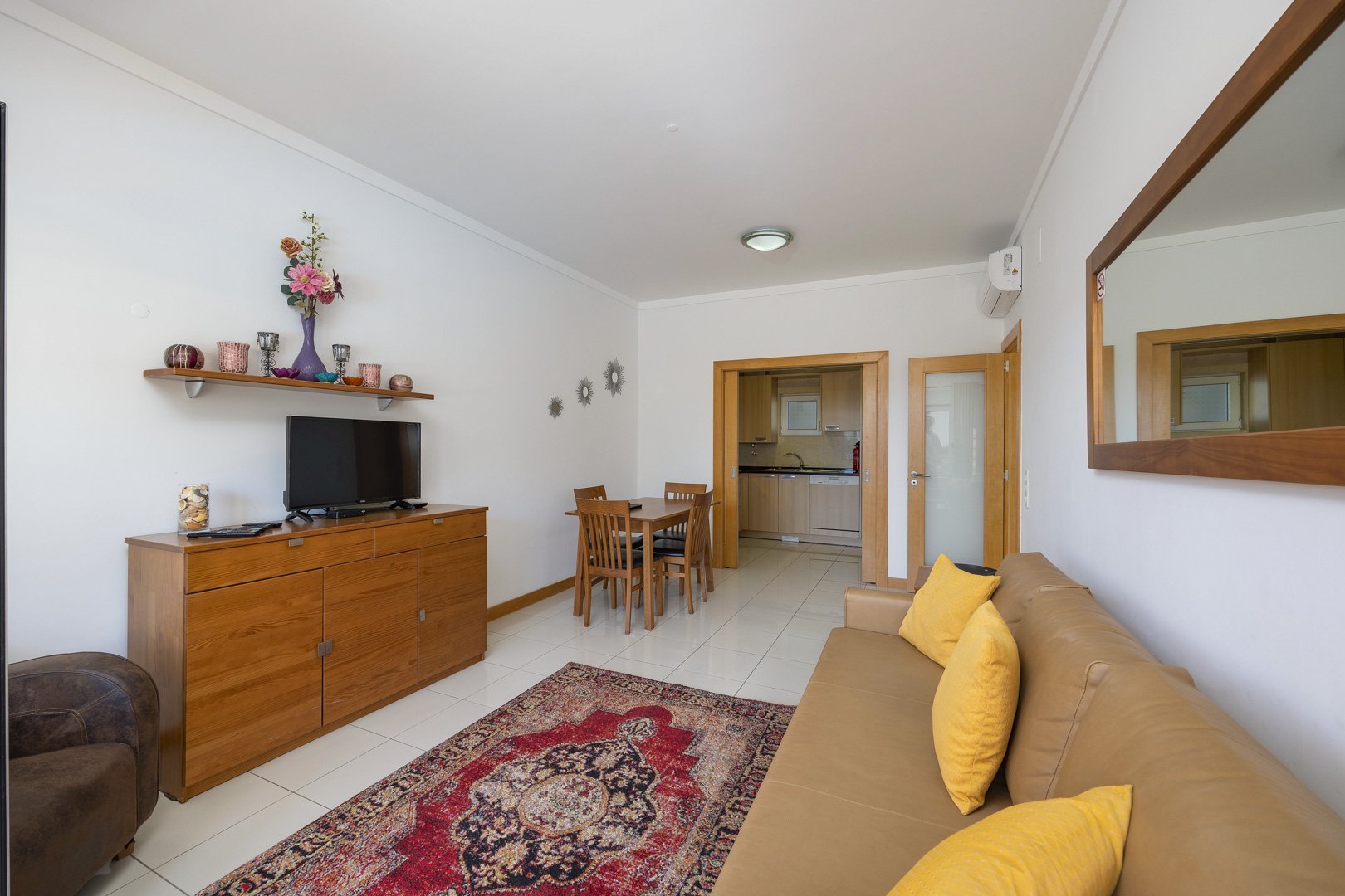 Living room with view through to the dining area and kitchen