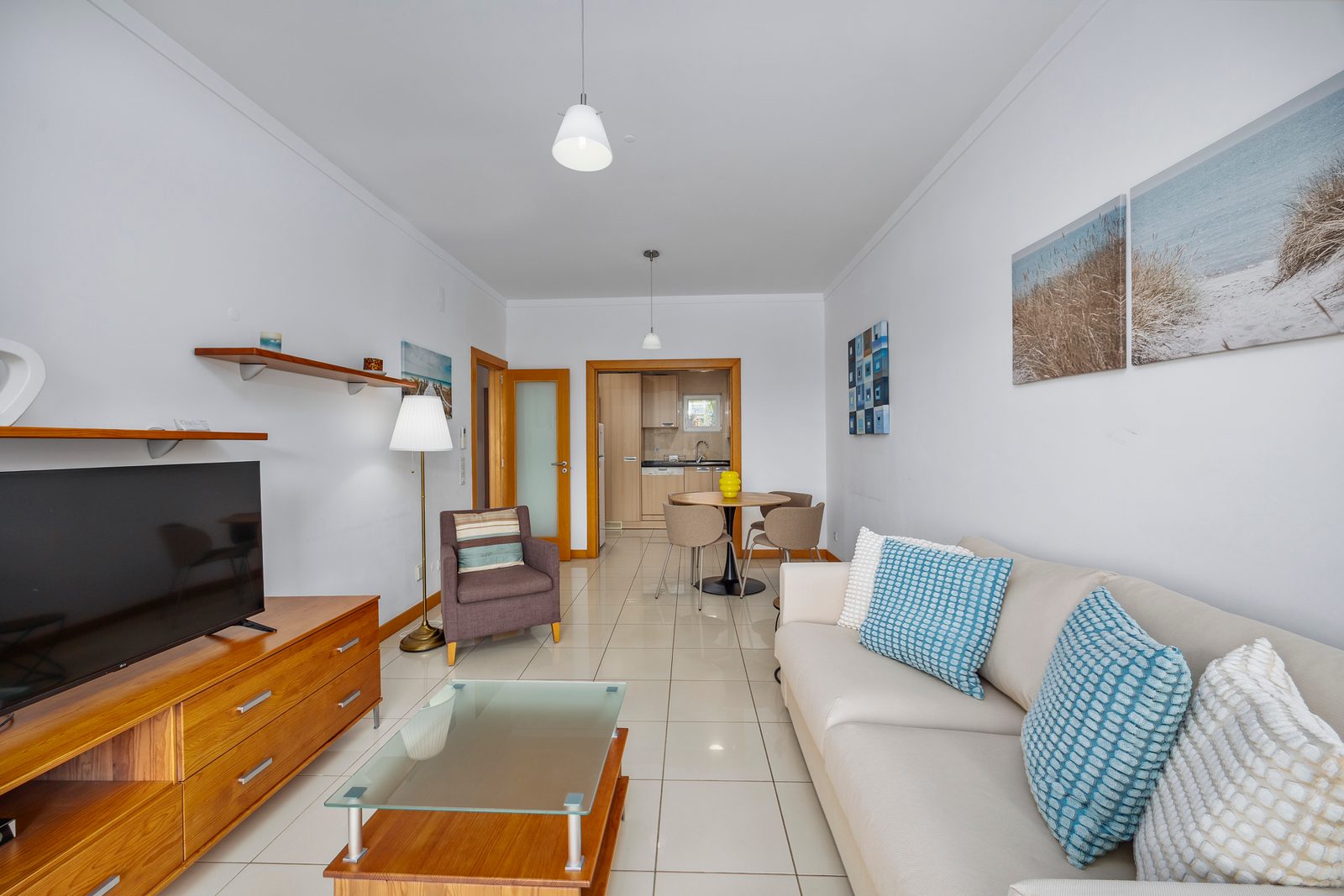 Living room with view through to the dining area and kitchen