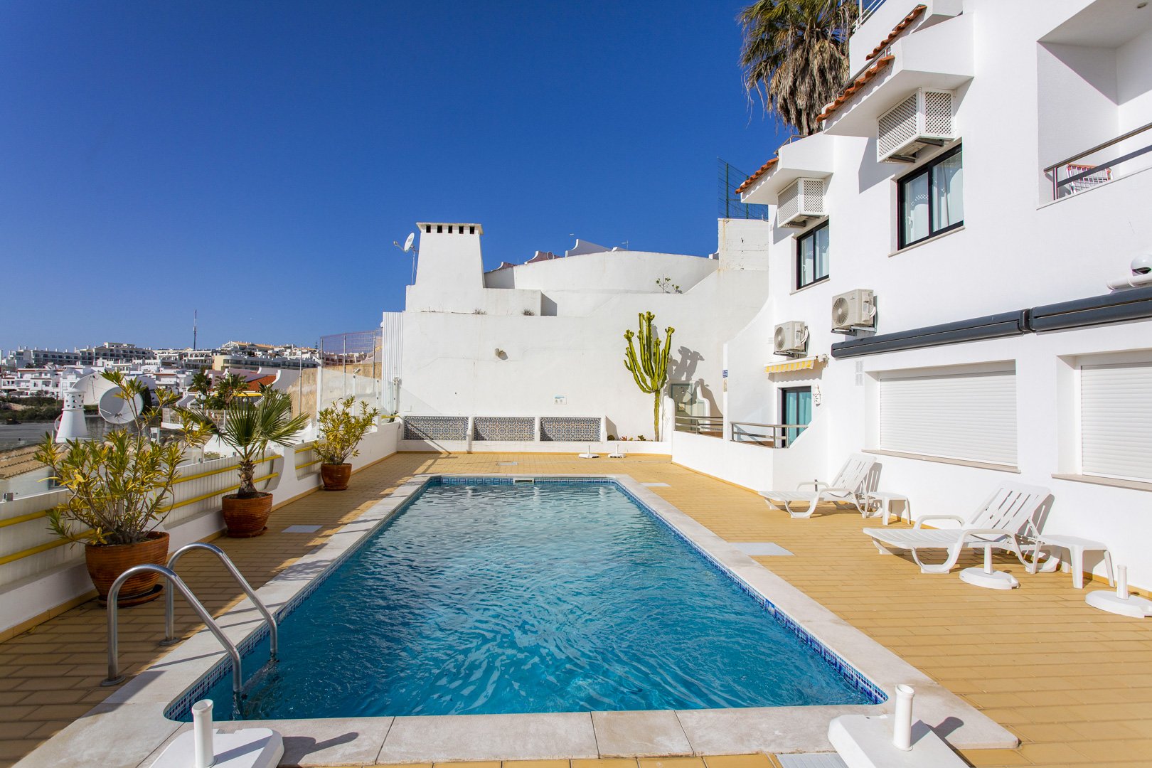 Ground-floor communal swimming pool and sun terrace, alternate view