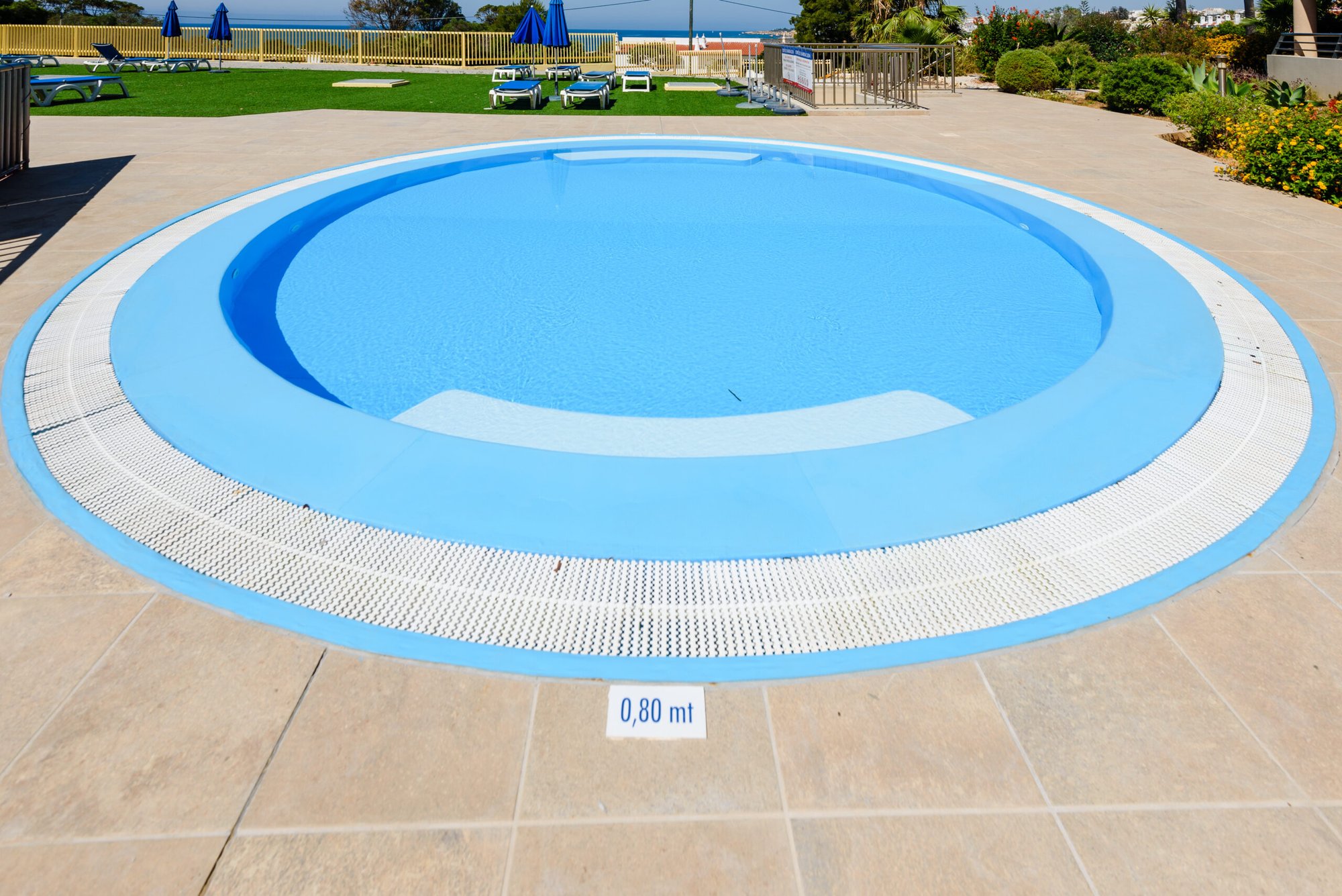 Circular kids' pool on the sundeck with sea view
