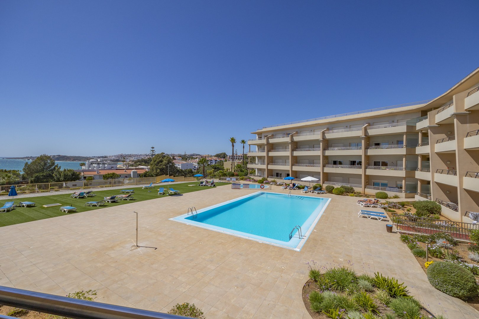Elevated view of the communal pool and building