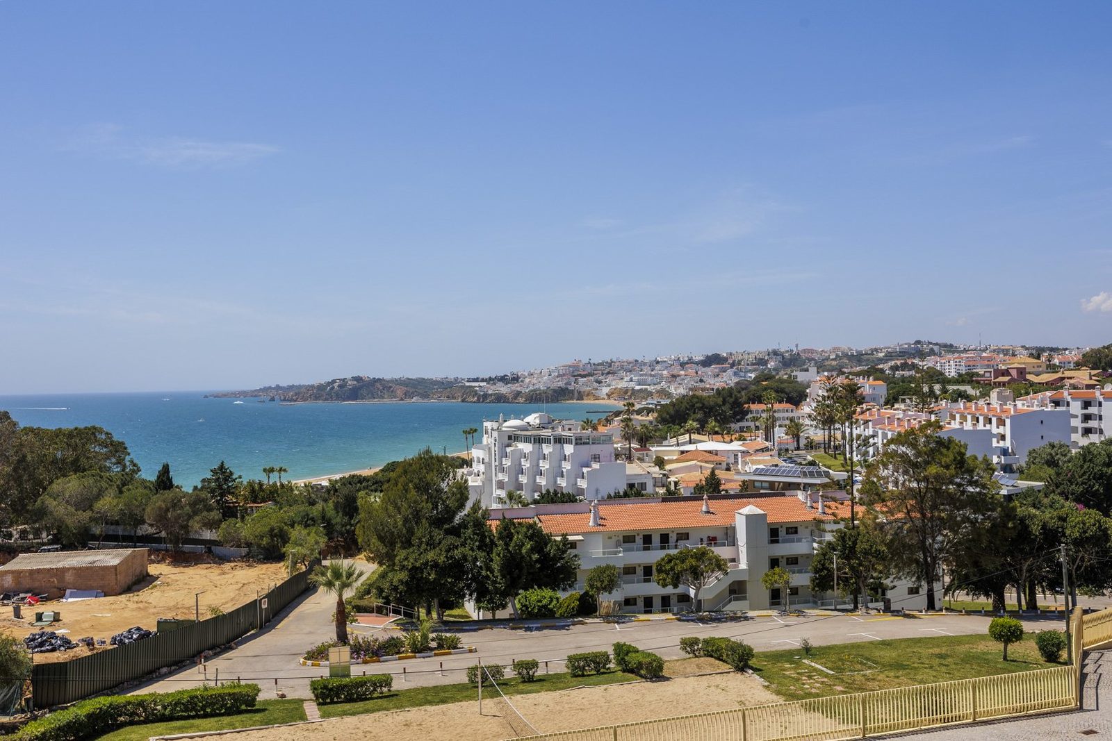 Elevated view over the beach, coastline, and town