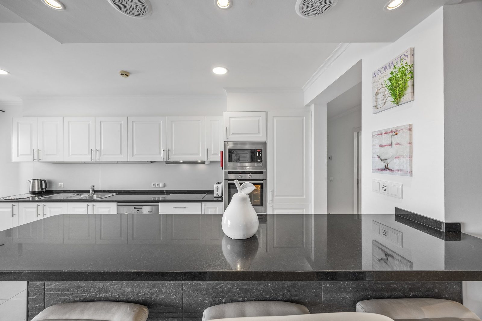 Kitchen with built-in oven and dining nook