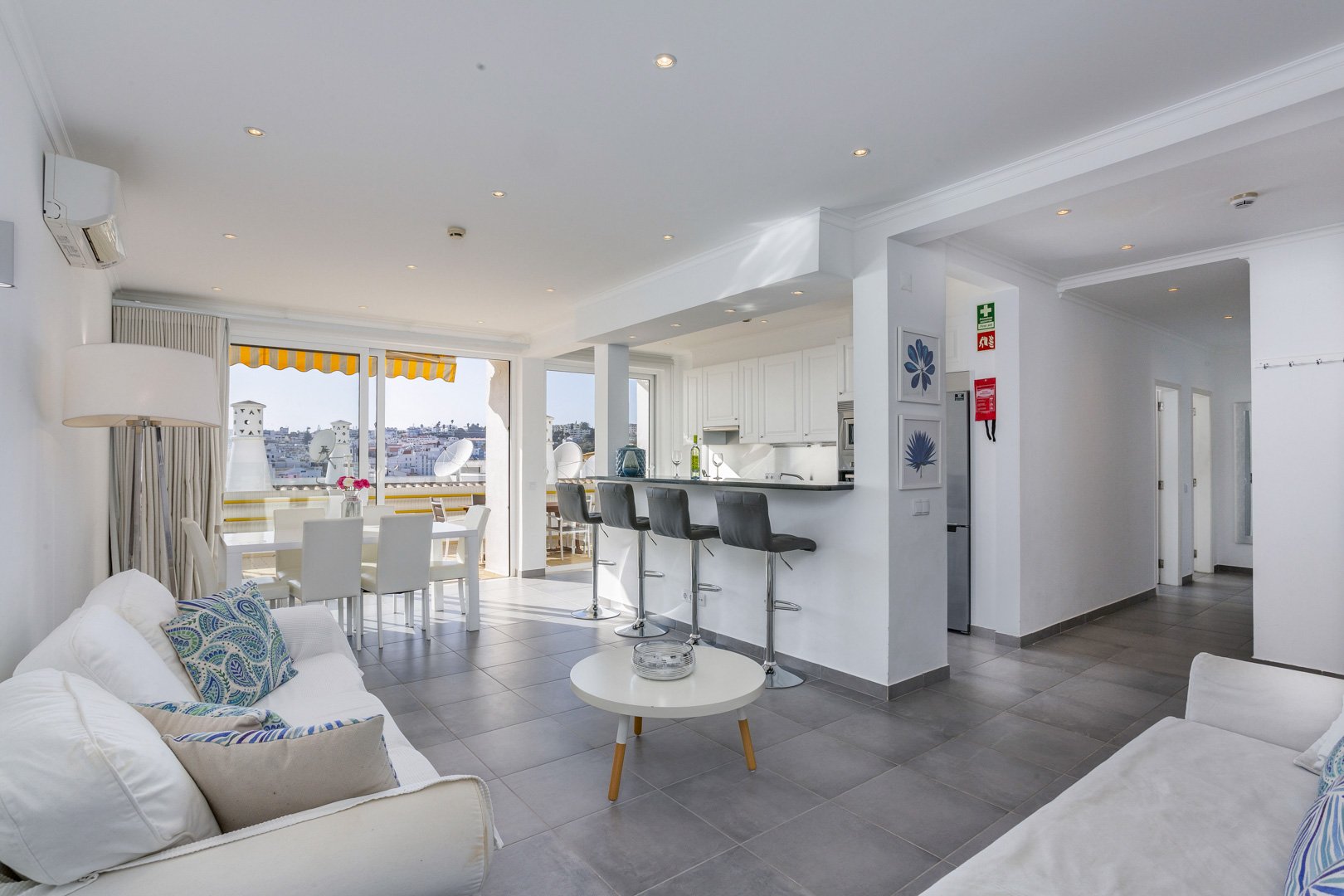 Open-plan living, dining, and kitchen area