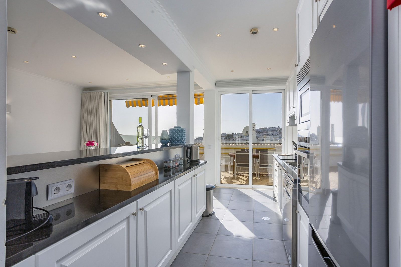 Galley kitchen with balcony access