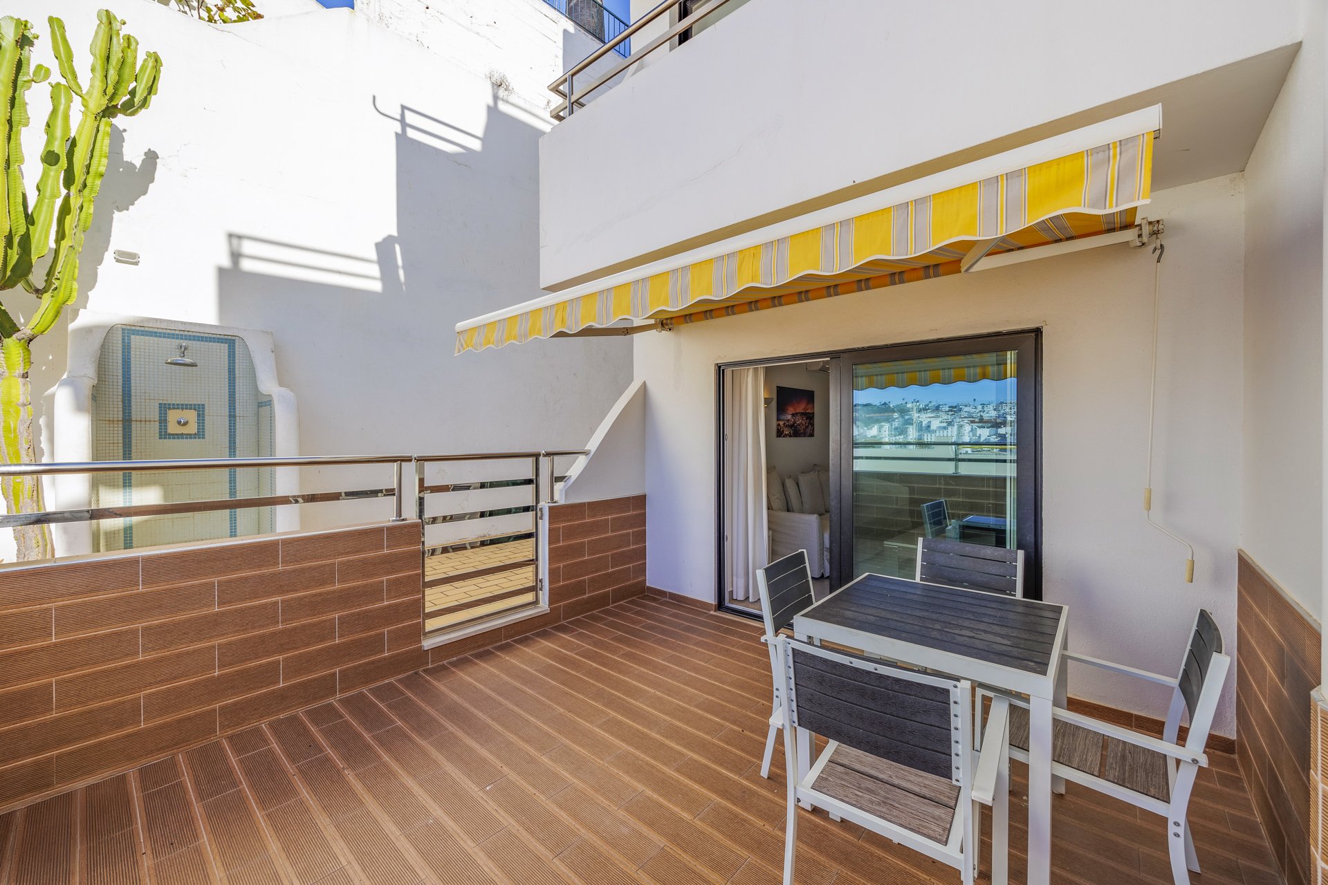 Terrace with outdoor shower and dining table