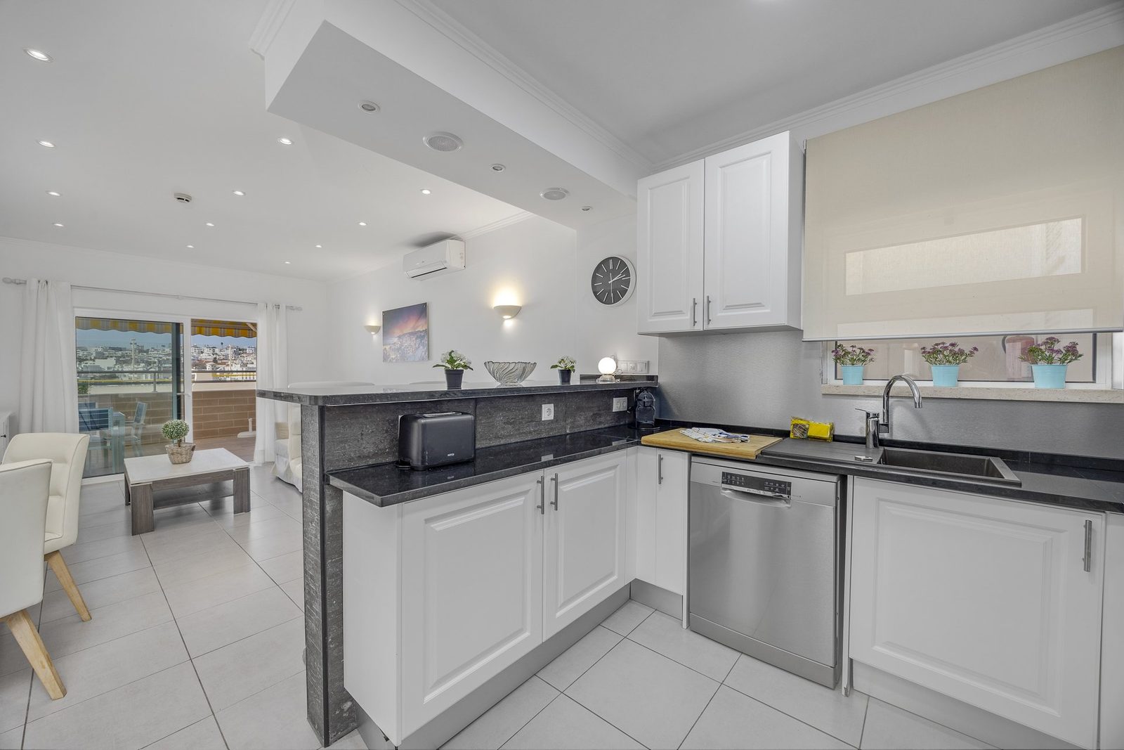 Open-plan living area with kitchen bar