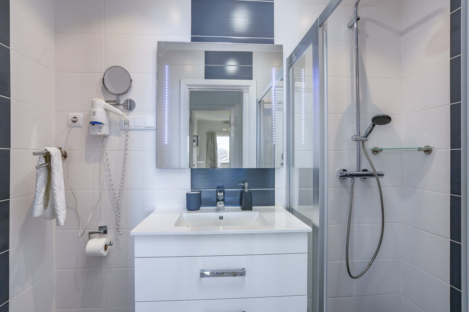 Bathroom with walk-in shower and rainfall showerhead
