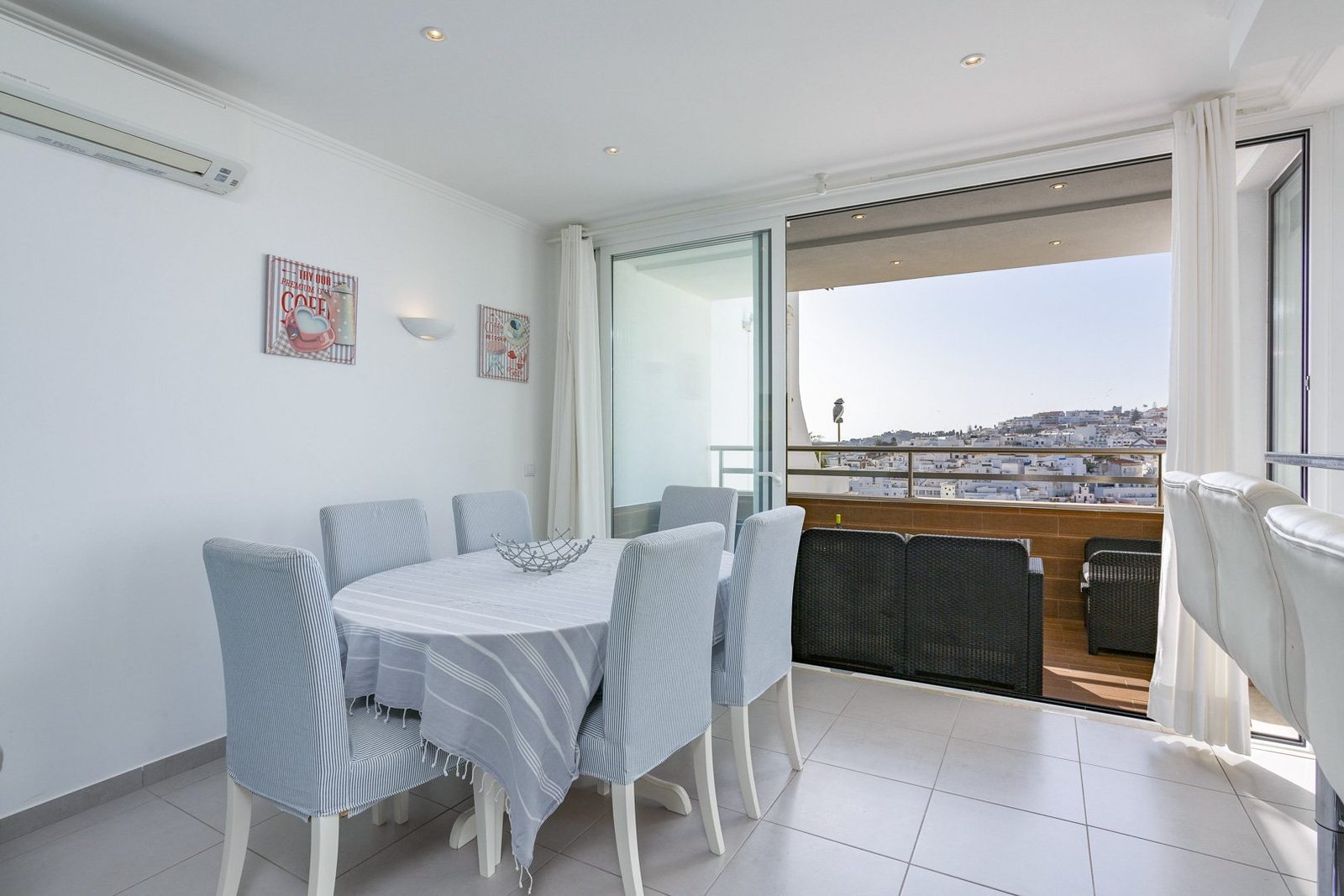 Dining table with balcony access