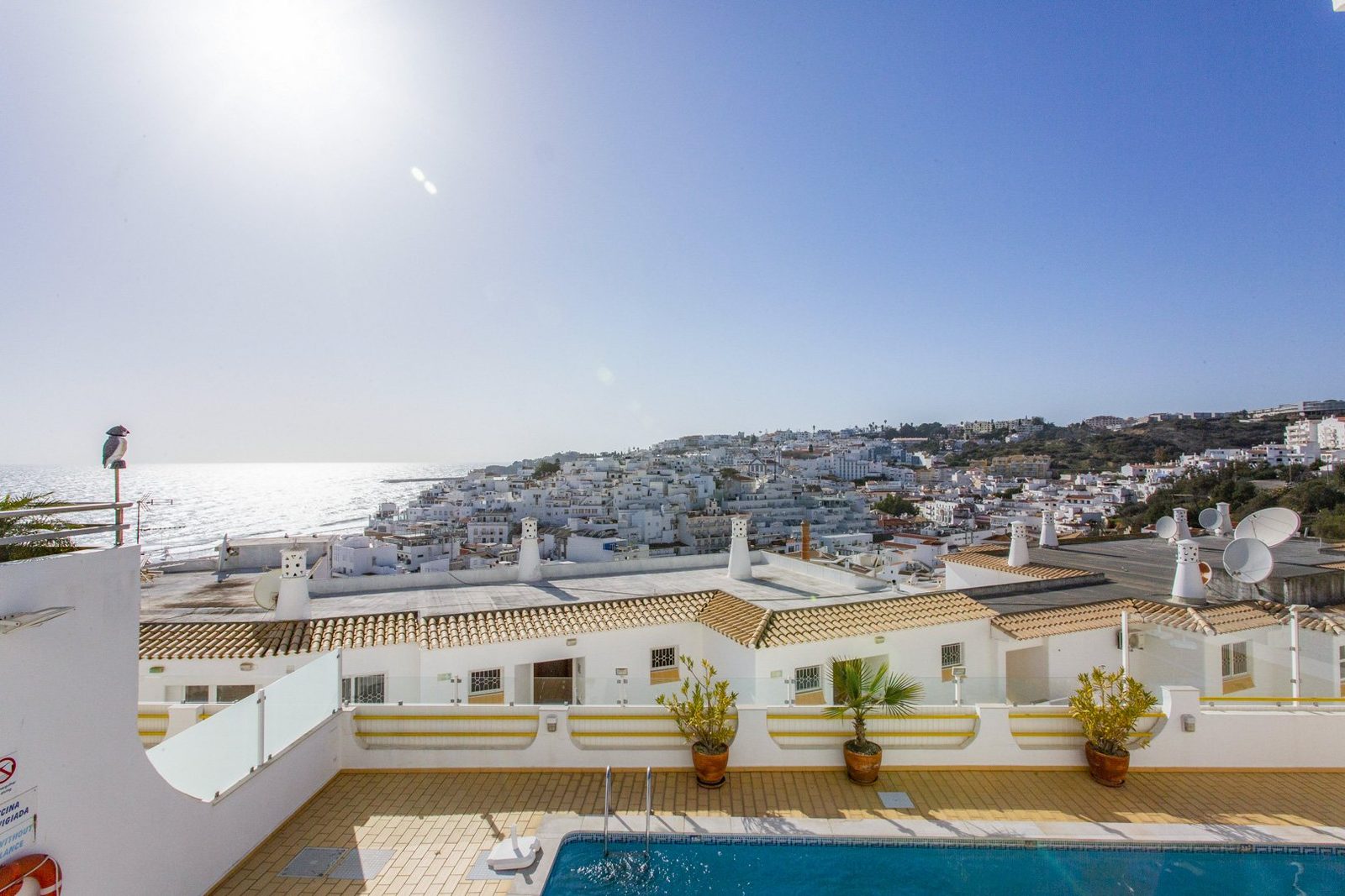 Private rooftop pool terrace with panoramic view of the old town and sea, alternate view