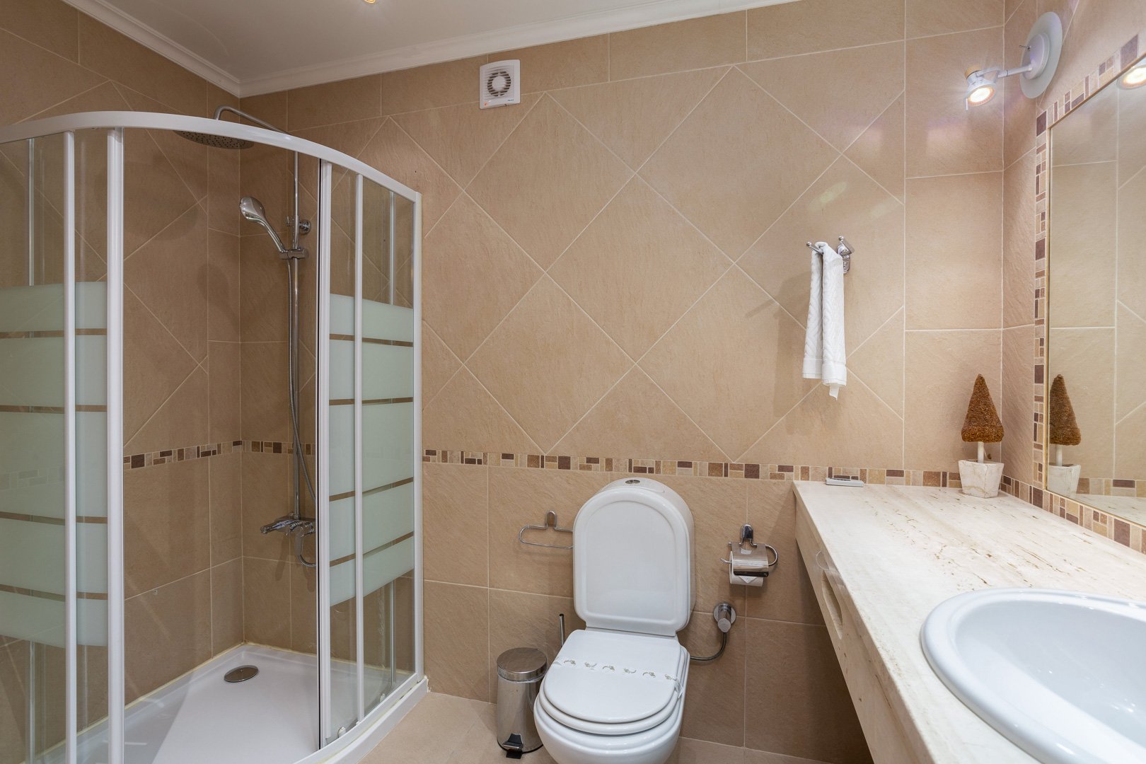 Bathroom with corner shower