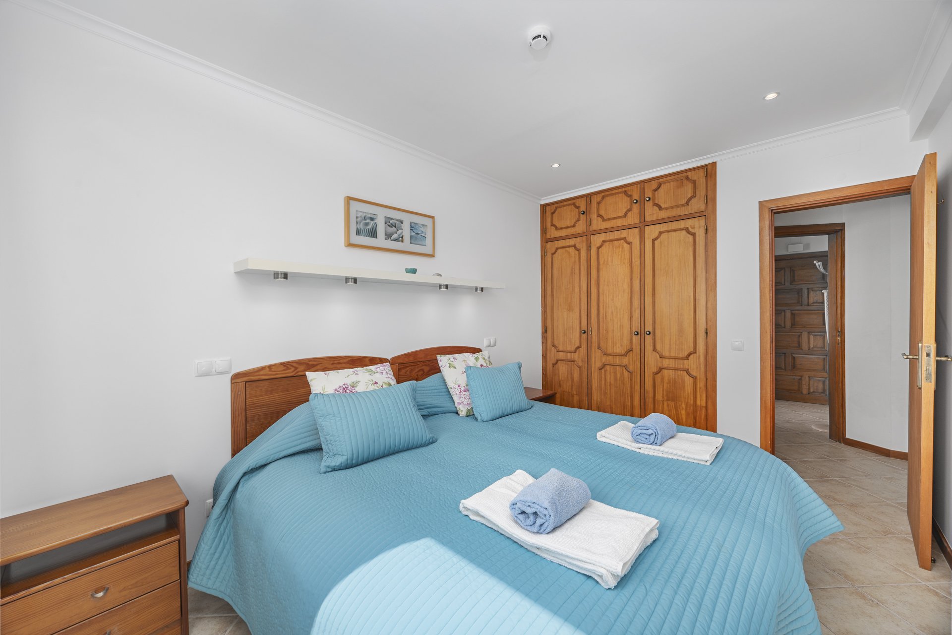 Bedroom with built-in wardrobe and en-suite access