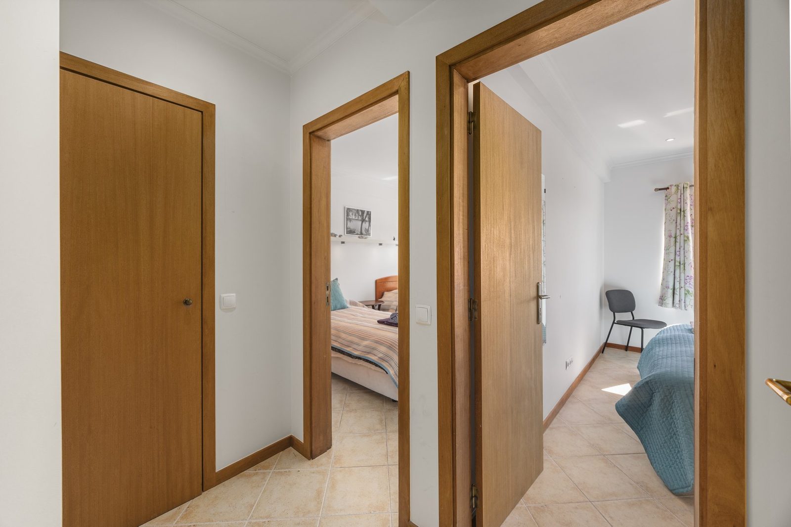 Hallway leading to two bedrooms