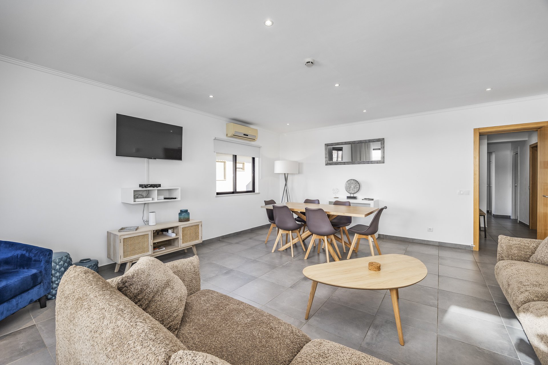 Dining area with table for six and wall mirror
