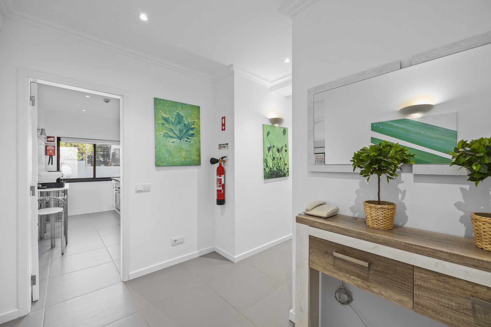 Hallway with console table and artwork