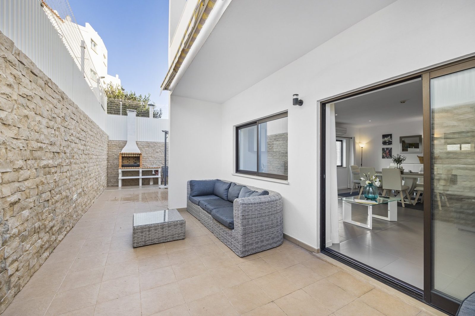 Private terrace with outdoor seating and barbecue